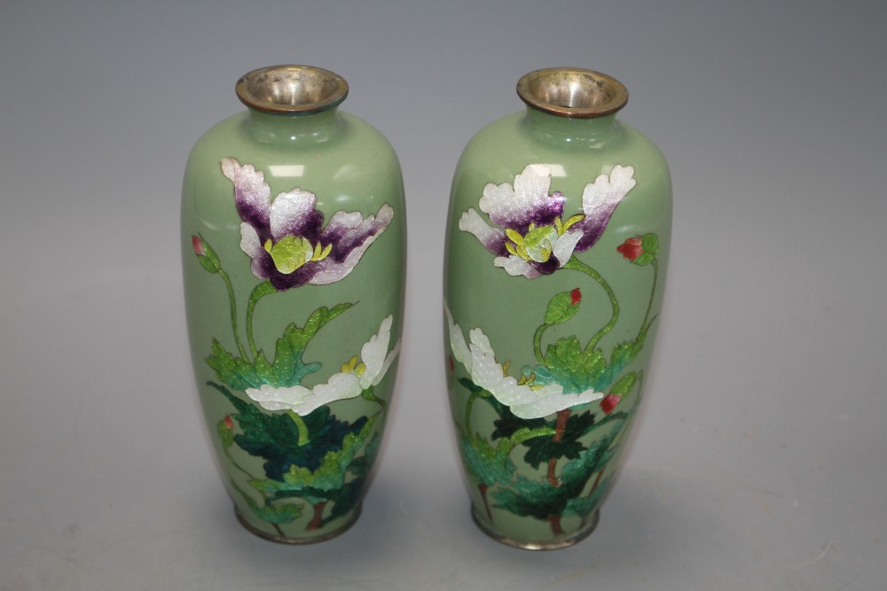 A pair of Japanese late Meiji period cloisonne vases, decorated with flowers on a celadon green ground, height 15cm, with original box